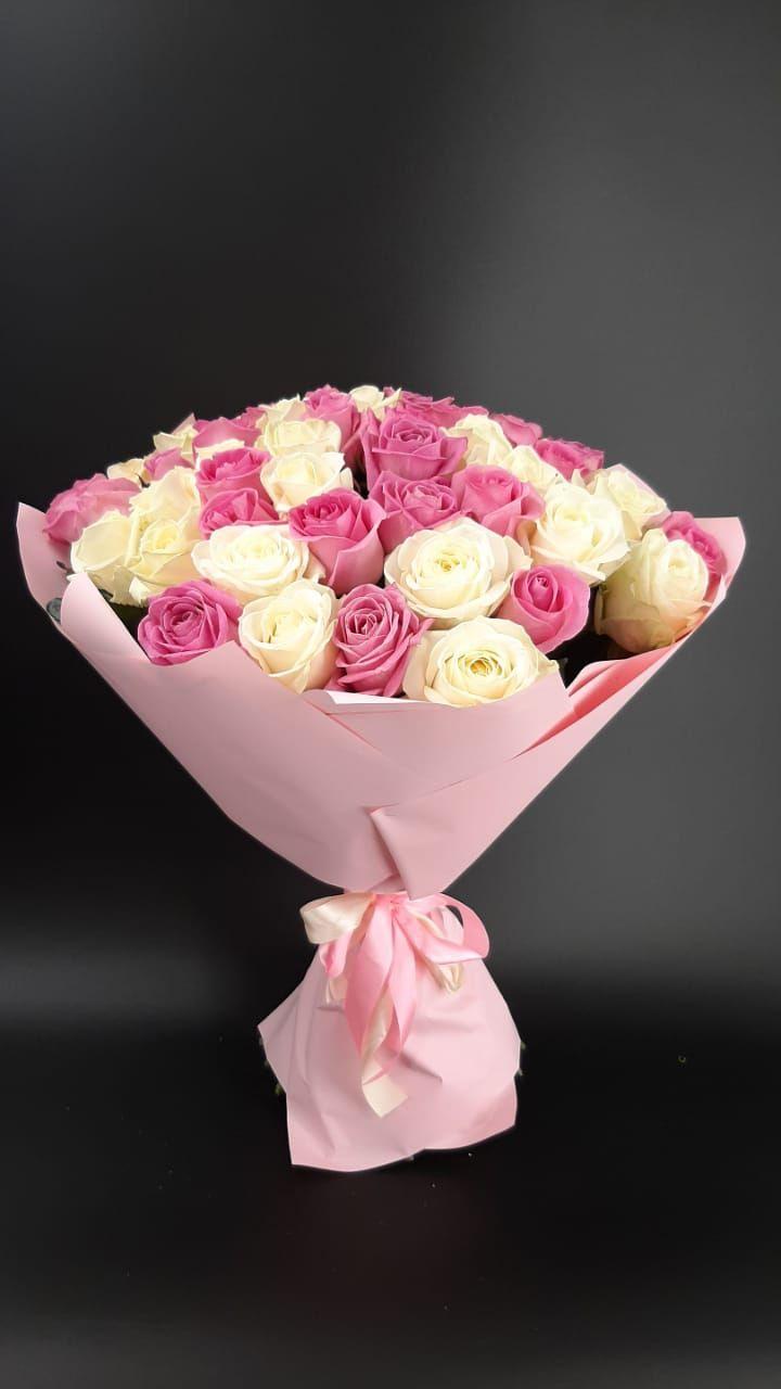 Corporate meeting room with carefully timed floral arrangements that maintain elegance throughout business hours